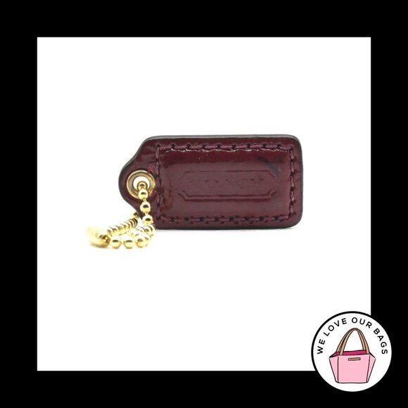 1.5" Small COACH Maroon Patent Leather Brass Key Fob Bag Charm Keychain Hang Tag - Picture 1 of 1